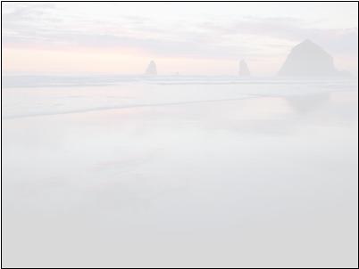 Pastel coastal rock formations reflected in water