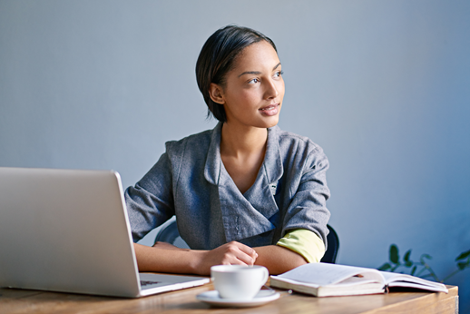 A person sitting at a laptop