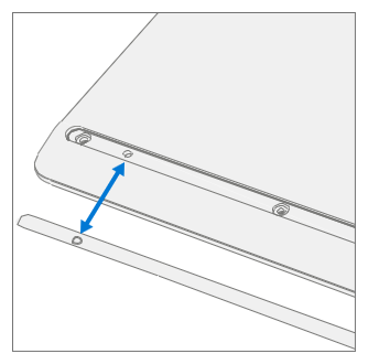 Pressing a replacement foot onto the bottom of a Surface device
