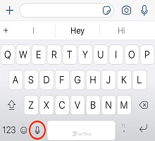 Microsoft SwiftKey keyboard with the microphone key highlighted