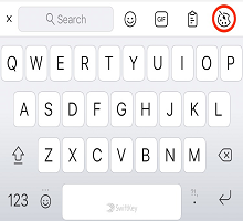 SwiftKey keyboard toolbar with the Themes button highlighted