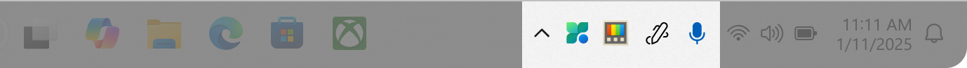 Screenshot of the Windows taskbar with some icons in the system tray area.